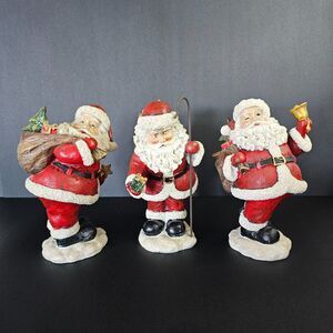 Christmas Santa Claus Figurines Set of 3 Holiday St Nick Statues Winking Present